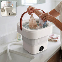 Compact foldable washing machine