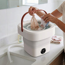 Compact foldable washing machine