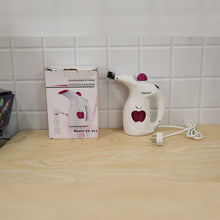 Handheld garment steamer
