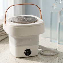 Compact foldable washing machine